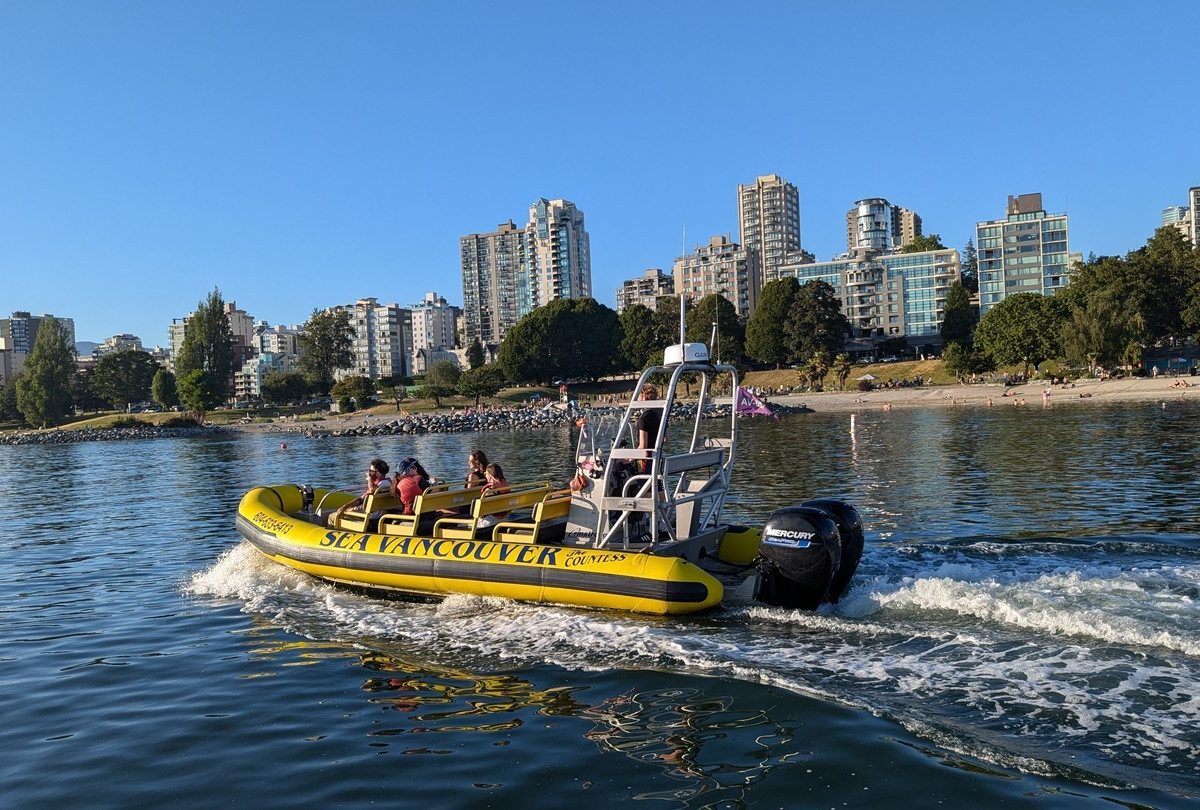 boat passing by english bay