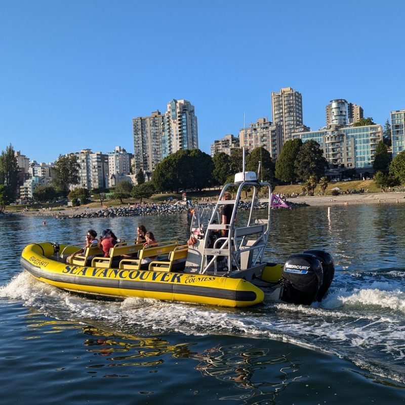 boat passing by english bay