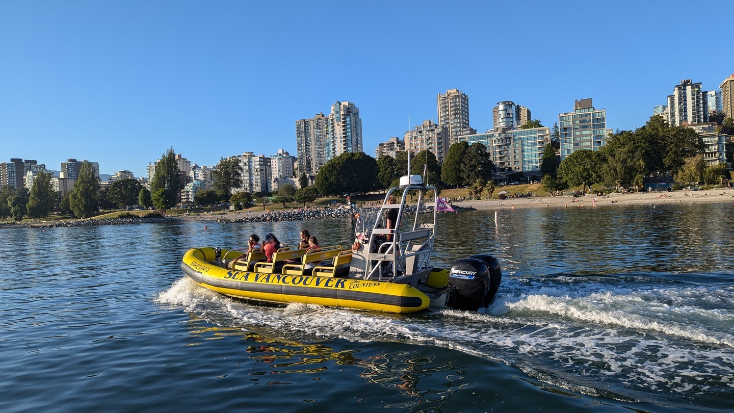 boat passing by english bay